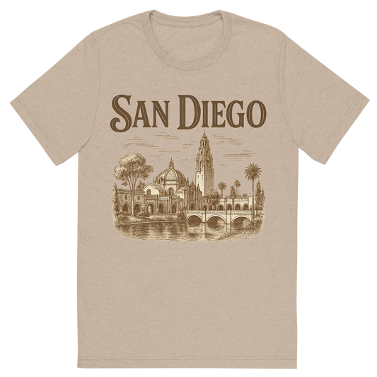 Front view of a Premium Tri-Blend Crew Neck T-Shirt in Tan showing 'A typographic, nostalgic graphic of a typographic illustration of the words 'san diego' with a vintage line art drawing of balboa park'
