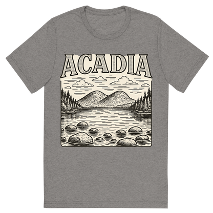 Front view of a Premium Tri-Blend Crew Neck T-Shirt in Grey showing 'A typographic, nostalgic graphic of a typographic illustration of the words 'acadia' with a vintage line art drawing of jordan pond'