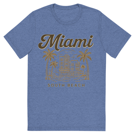 Front view of a Premium Tri-Blend Crew Neck T-Shirt in Blue showing 'A typographic, nostalgic graphic of a typographic illustration of the words 'miami' with a vintage line art drawing of south beach'