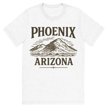 Front view of a Premium Tri-Blend Crew Neck T-Shirt in Solid White showing 'A typographic, nostalgic graphic of a typographic illustration of the words 'phoenix, arizona' with a vintage line art drawing of camelback mountain'