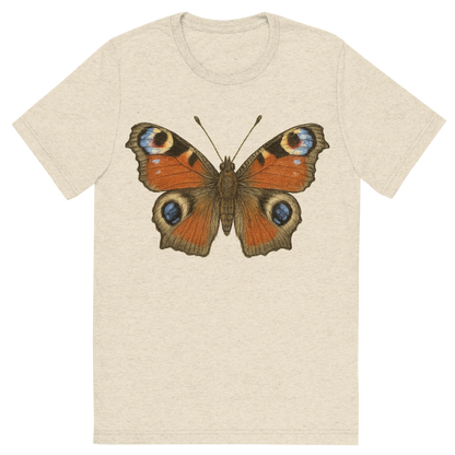 Front view of a Premium Tri-Blend Crew Neck T-Shirt in Oatmeal showing 'A hand-drawn, tranquil graphic of peacock butterfly'