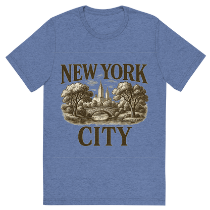 Front view of a Premium Tri-Blend Crew Neck T-Shirt in Blue showing 'A typographic, nostalgic graphic of a typographic illustration of the words 'new york city' with a vintage line art drawing of central park'