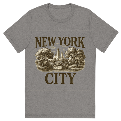 Front view of a Premium Tri-Blend Crew Neck T-Shirt in Grey showing 'A typographic, nostalgic graphic of a typographic illustration of the words 'new york city' with a vintage line art drawing of central park'