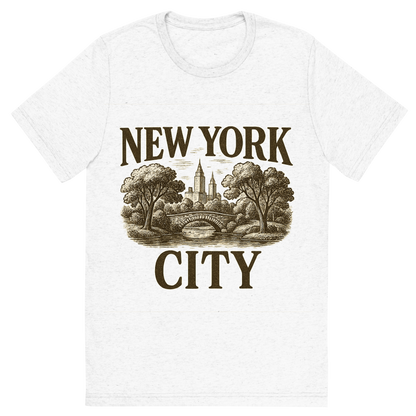 Front view of a Premium Tri-Blend Crew Neck T-Shirt in Solid White showing 'A typographic, nostalgic graphic of a typographic illustration of the words 'new york city' with a vintage line art drawing of central park'