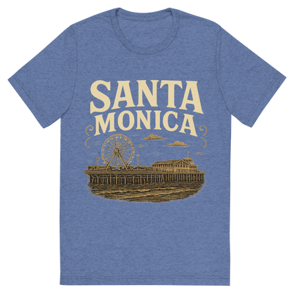 Front view of a Premium Tri-Blend Crew Neck T-Shirt in Blue showing 'A typographic, nostalgic graphic of a typographic illustration of the words 'santa monica' with a vintage line art drawing of the santa monica pier'