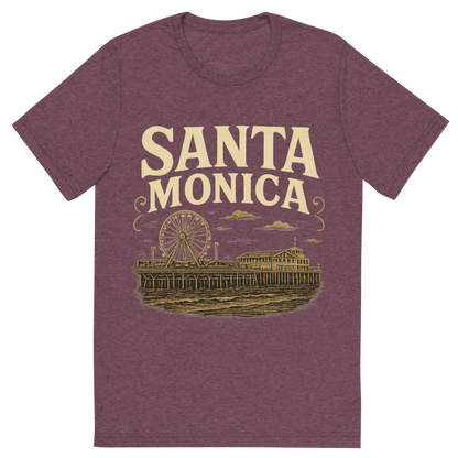 Front view of a Premium Tri-Blend Crew Neck T-Shirt in Maroon showing 'A typographic, nostalgic graphic of a typographic illustration of the words 'santa monica' with a vintage line art drawing of the santa monica pier'