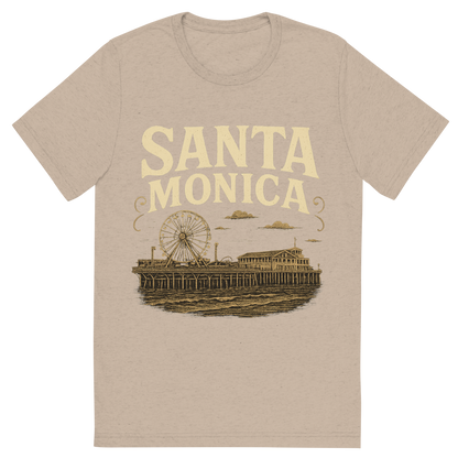 Front view of a Premium Tri-Blend Crew Neck T-Shirt in Tan showing 'A typographic, nostalgic graphic of a typographic illustration of the words 'santa monica' with a vintage line art drawing of the santa monica pier'