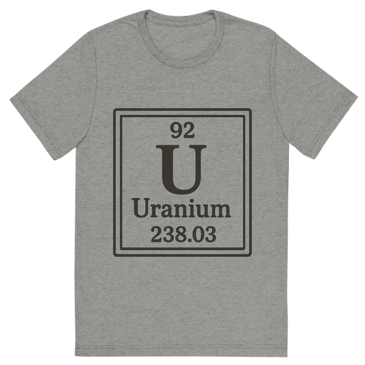 Front view of a Premium Tri-Blend Crew Neck T-Shirt in Athletic Grey showing 'A line art, nostalgic graphic of uranium's entry on the periodic table, use a dark color for the lines and text'