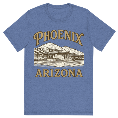 Front view of a Premium Tri-Blend Crew Neck T-Shirt in Blue showing 'A typographic, nostalgic graphic of a typographic illustration of the words 'phoenix, arizona' with a vintage line art drawing of taliesin west'