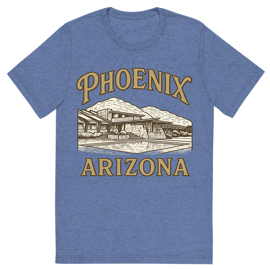 Front view of a Premium Tri-Blend Crew Neck T-Shirt in Blue showing 'A typographic, nostalgic graphic of a typographic illustration of the words 'phoenix, arizona' with a vintage line art drawing of taliesin west'