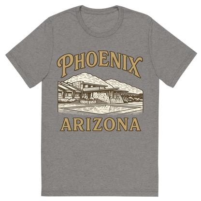 Front view of a Premium Tri-Blend Crew Neck T-Shirt in Grey showing 'A typographic, nostalgic graphic of a typographic illustration of the words 'phoenix, arizona' with a vintage line art drawing of taliesin west'