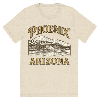 Front view of a Premium Tri-Blend Crew Neck T-Shirt in Oatmeal showing 'A typographic, nostalgic graphic of a typographic illustration of the words 'phoenix, arizona' with a vintage line art drawing of taliesin west'