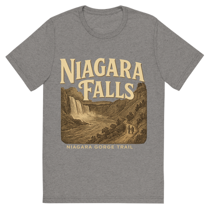 Front view of a Premium Tri-Blend Crew Neck T-Shirt in Grey showing 'A typographic, nostalgic graphic of a typographic illustration of the words 'niagara falls' with a vintage line art drawing of the niagara gorge trail'