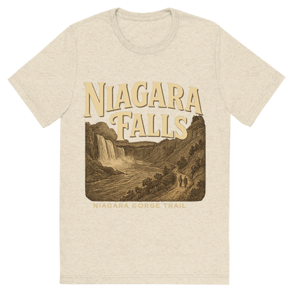 Front view of a Premium Tri-Blend Crew Neck T-Shirt in Oatmeal showing 'A typographic, nostalgic graphic of a typographic illustration of the words 'niagara falls' with a vintage line art drawing of the niagara gorge trail'