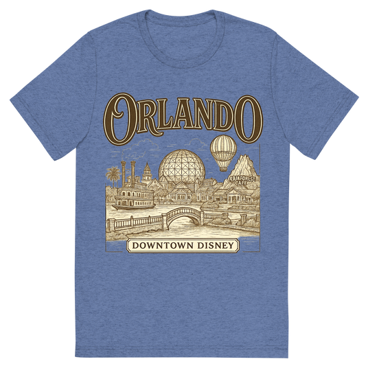 Front view of a Premium Tri-Blend Crew Neck T-Shirt in Blue showing 'A typographic, nostalgic graphic of a typographic illustration of the words 'orlando' with a vintage line art drawing of downtown disney'