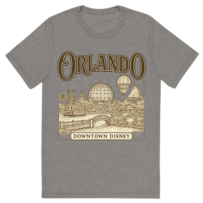 Front view of a Premium Tri-Blend Crew Neck T-Shirt in Grey showing 'A typographic, nostalgic graphic of a typographic illustration of the words 'orlando' with a vintage line art drawing of downtown disney'