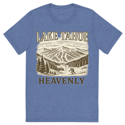 Front view of a Premium Tri-Blend Crew Neck T-Shirt in Blue showing 'A typographic, nostalgic graphic of a typographic illustration of the words 'lake tahoe' with a vintage line art drawing of the heavenly ski resort'