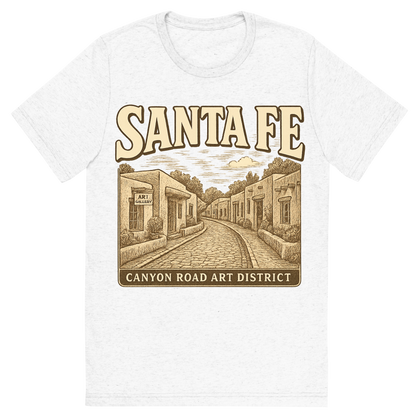 Front view of a Premium Tri-Blend Crew Neck T-Shirt in Solid White showing 'A typographic, nostalgic graphic of a typographic illustration of the words 'santa fe' with a vintage line art drawing of the canyon road art district'