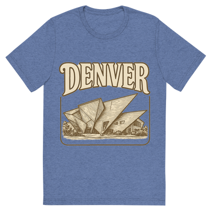 Front view of a Premium Tri-Blend Crew Neck T-Shirt in Blue showing 'A typographic, nostalgic graphic of a typographic illustration of the words 'denver' with a vintage line art drawing of the denver art museum'