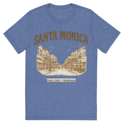 Front view of a Premium Tri-Blend Crew Neck T-Shirt in Blue showing 'A typographic, nostalgic graphic of a typographic illustration of the words 'santa monica' with a vintage line art drawing of the third street promenade'