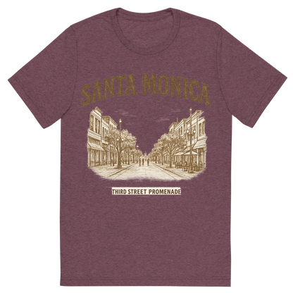 Front view of a Premium Tri-Blend Crew Neck T-Shirt in Maroon showing 'A typographic, nostalgic graphic of a typographic illustration of the words 'santa monica' with a vintage line art drawing of the third street promenade'