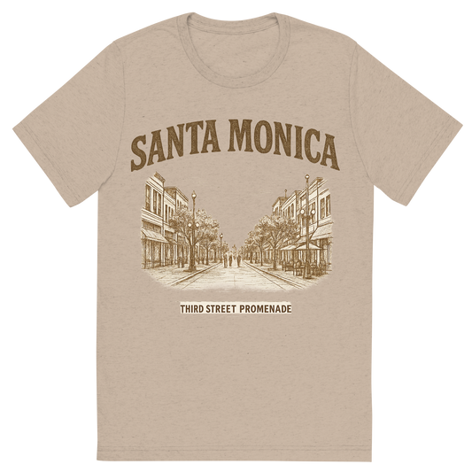 Front view of a Premium Tri-Blend Crew Neck T-Shirt in Tan showing 'A typographic, nostalgic graphic of a typographic illustration of the words 'santa monica' with a vintage line art drawing of the third street promenade'