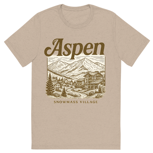 Front view of a Premium Tri-Blend Crew Neck T-Shirt in Tan showing 'A typographic, nostalgic graphic of a typographic illustration of the words 'aspen' with a vintage line art drawing of snowmass village'