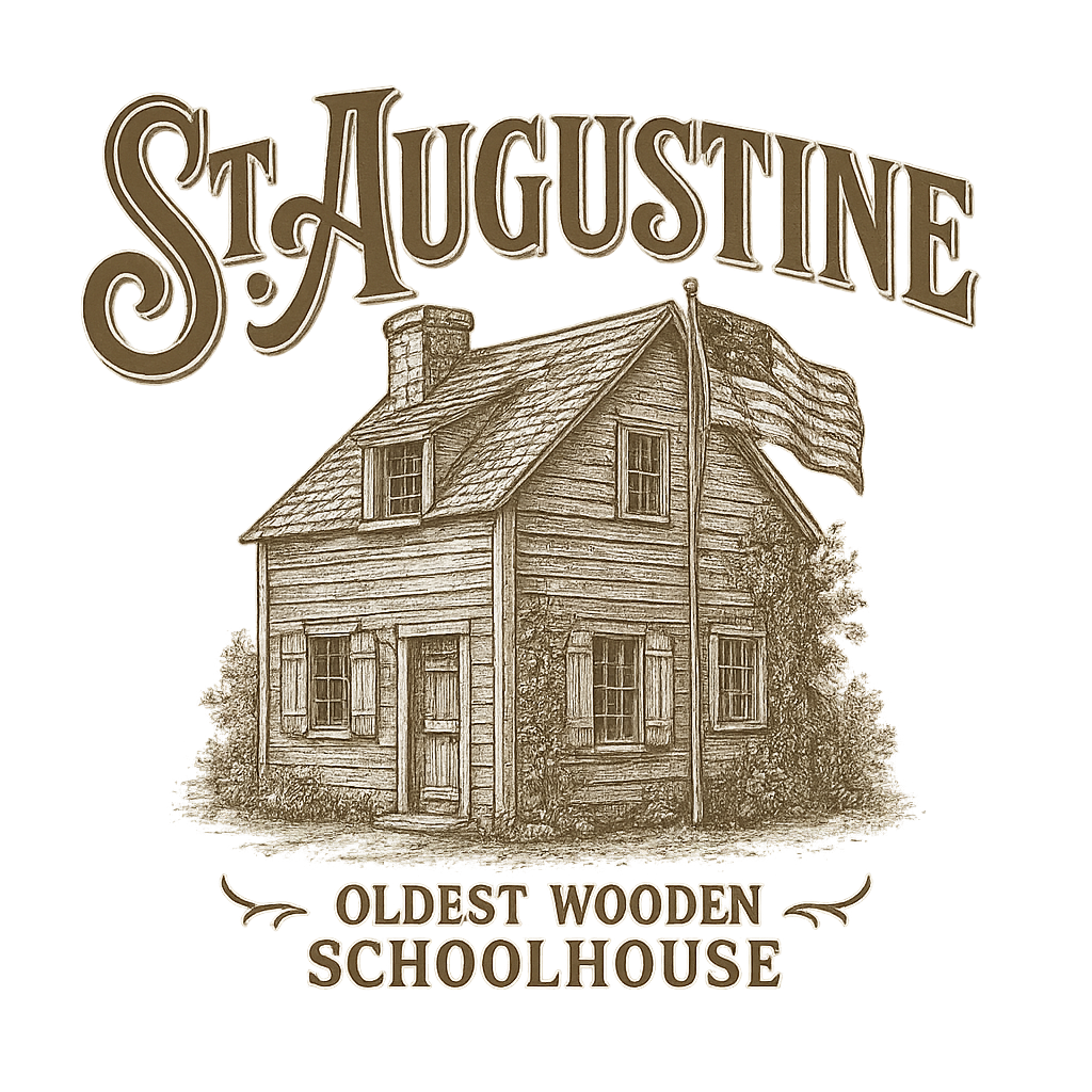 A typographic, nostalgic graphic of a typographic illustration of the words 'st. augustine' with a vintage line art drawing of the oldest wooden schoolhouse – a t-shirt design