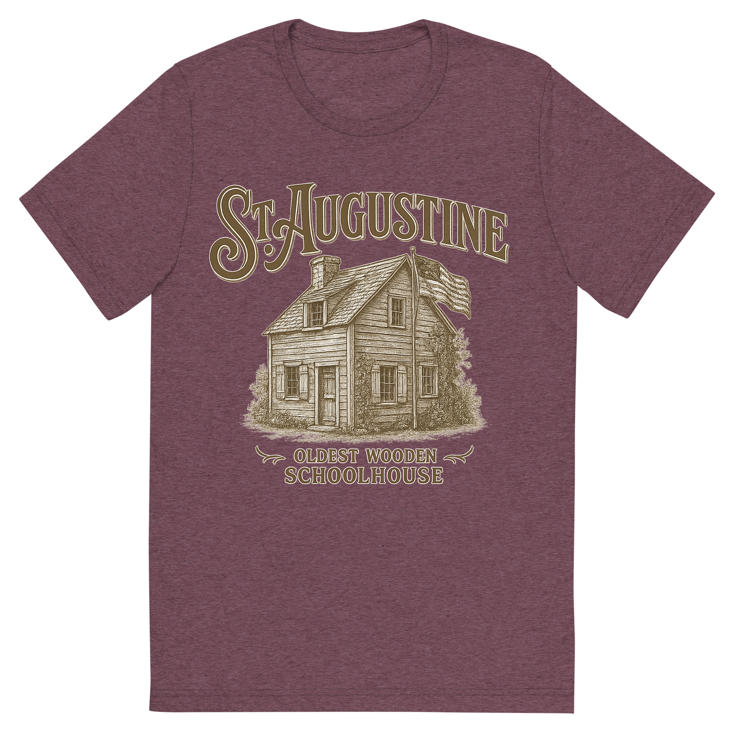Front view of a Premium Tri-Blend Crew Neck T-Shirt in Maroon showing 'A typographic, nostalgic graphic of a typographic illustration of the words 'st. augustine' with a vintage line art drawing of the oldest wooden schoolhouse'