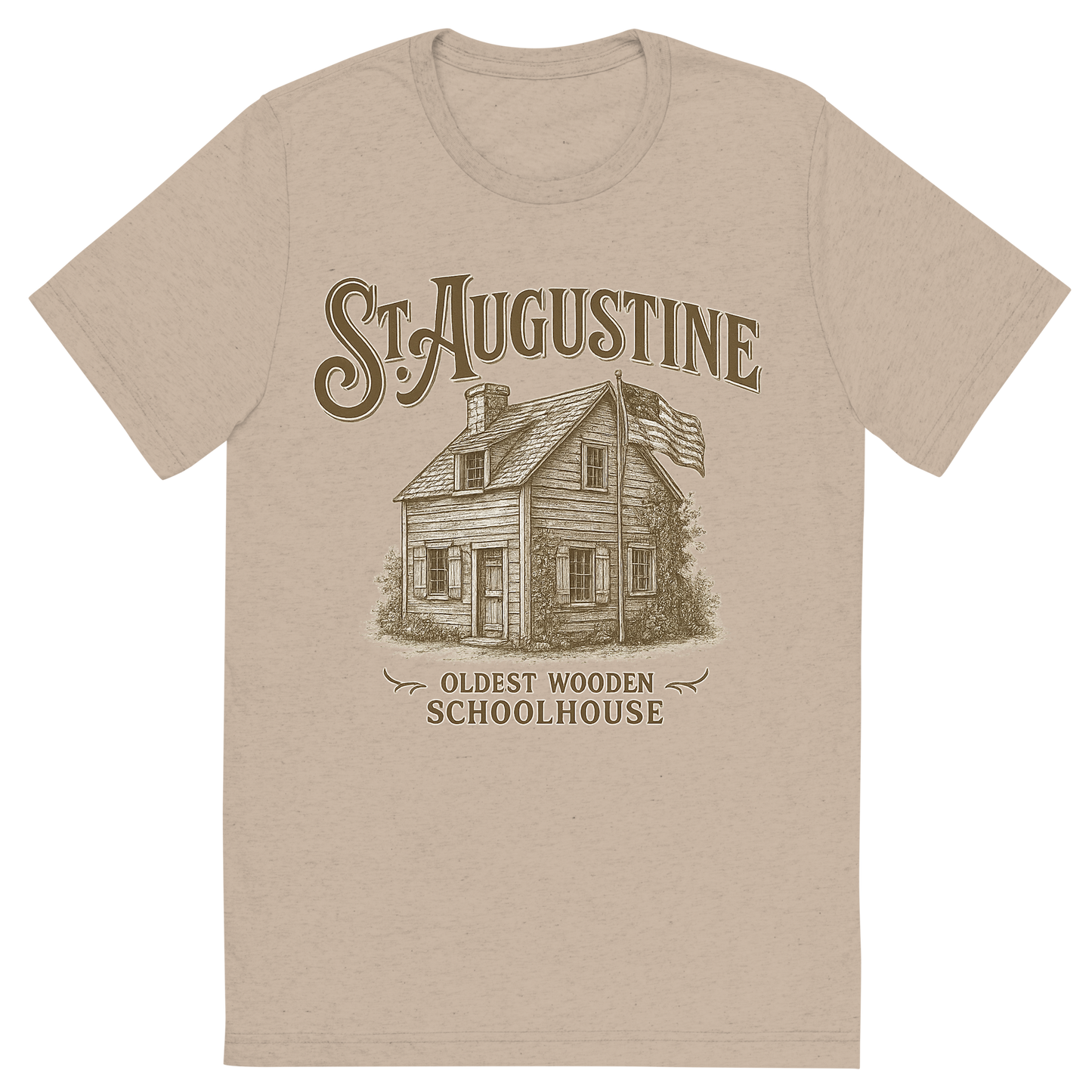 Front view of a Premium Tri-Blend Crew Neck T-Shirt in Tan showing 'A typographic, nostalgic graphic of a typographic illustration of the words 'st. augustine' with a vintage line art drawing of the oldest wooden schoolhouse'