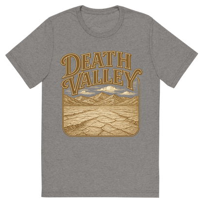 Front view of a Premium Tri-Blend Crew Neck T-Shirt in Grey showing 'A typographic, nostalgic graphic of a typographic illustration of the words 'death valley' with a vintage line art drawing of the badwater basin'