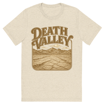 Front view of a Premium Tri-Blend Crew Neck T-Shirt in Oatmeal showing 'A typographic, nostalgic graphic of a typographic illustration of the words 'death valley' with a vintage line art drawing of the badwater basin'