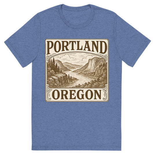 Front view of a Premium Tri-Blend Crew Neck T-Shirt in Blue showing 'A typographic, nostalgic graphic of a typographic illustration of the words 'portland, oregon' with a vintage line art drawing of the columbia river gorge'