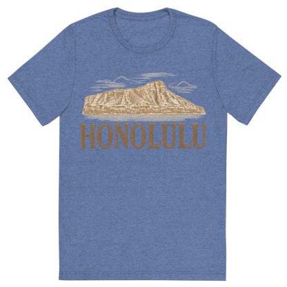 Front view of a Premium Tri-Blend Crew Neck T-Shirt in Blue showing 'A typographic, nostalgic graphic of a typographic illustration of the words 'honolulu' with a vintage line art drawing of the diamond head crater'