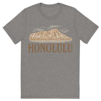 Front view of a Premium Tri-Blend Crew Neck T-Shirt in Grey showing 'A typographic, nostalgic graphic of a typographic illustration of the words 'honolulu' with a vintage line art drawing of the diamond head crater'
