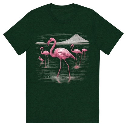 Front view of a Premium Tri-Blend Crew Neck T-Shirt in Emerald showing 'A hand-drawn ink with color pops, elegant graphic of a graceful group of pink flamingos wading through the shallow, reflective waters of lake natron, illustrated in a hand-drawn ink style with pops of vivid pink and white, centered composition, transparent background, optimized for dtg printing'