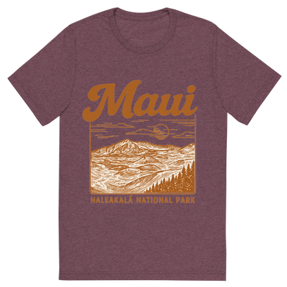 Front view of a Premium Tri-Blend Crew Neck T-Shirt in Maroon showing 'A typographic, nostalgic graphic of a typographic illustration of the words 'maui' with a vintage line art drawing of haleakalā national park'
