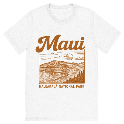 Front view of a Premium Tri-Blend Crew Neck T-Shirt in Solid White showing 'A typographic, nostalgic graphic of a typographic illustration of the words 'maui' with a vintage line art drawing of haleakalā national park'