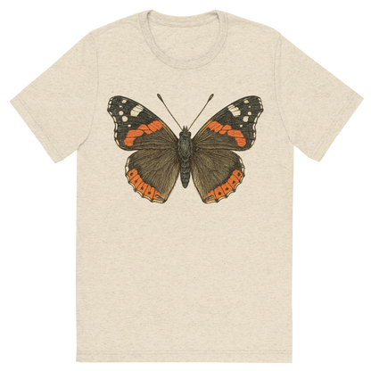 Front view of a Premium Tri-Blend Crew Neck T-Shirt in Oatmeal showing 'A hand-drawn, tranquil graphic of red admiral butterfly'