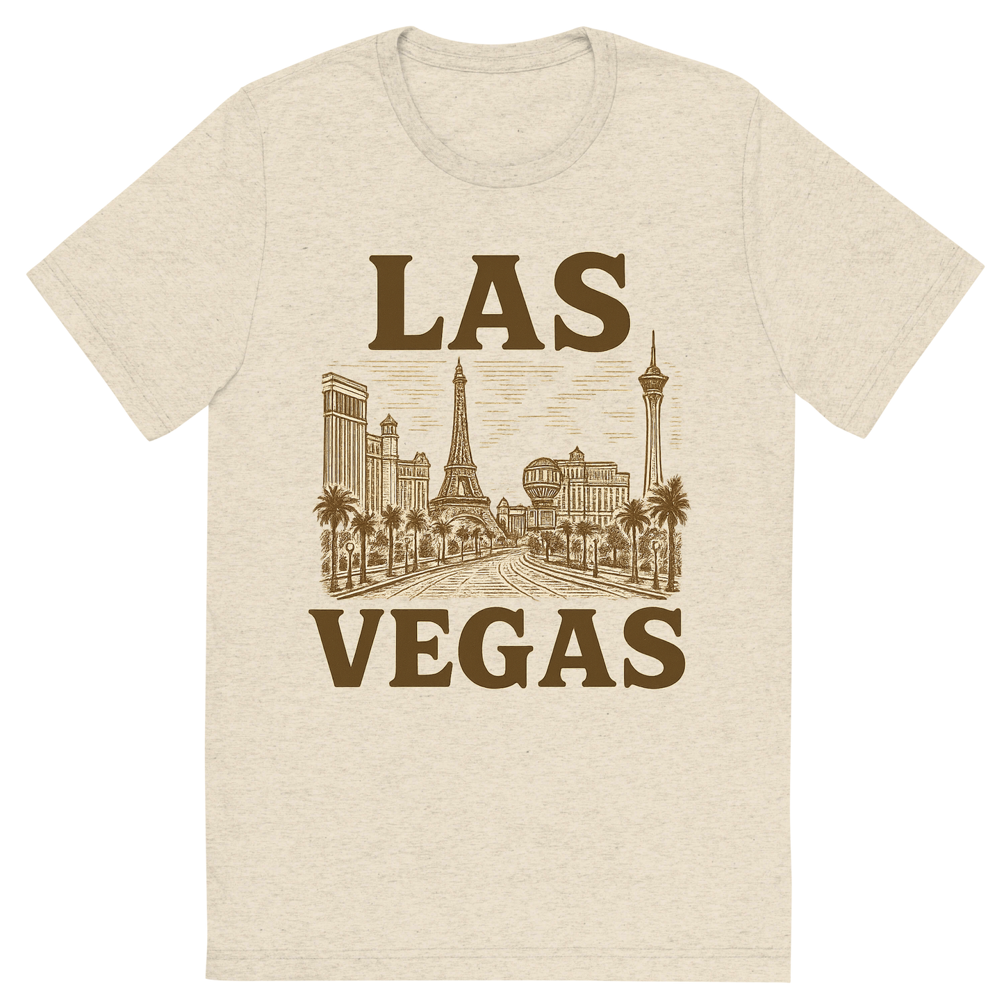 Front view of a Premium Tri-Blend Crew Neck T-Shirt in Oatmeal showing 'A typographic, nostalgic graphic of a typographic illustration of the words 'las vegas' with a vintage line art drawing of the strip'