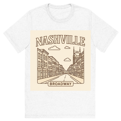 Front view of a Premium Tri-Blend Crew Neck T-Shirt in Solid White showing 'A minimalist, playful graphic of a typographic illustration of the words 'nashville' with a vintage line art drawing of broadway street'