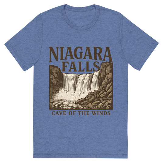 Front view of a Premium Tri-Blend Crew Neck T-Shirt in Blue showing 'A typographic, nostalgic graphic of a typographic illustration of the words 'niagara falls' with a vintage line art drawing of the cave of the winds'
