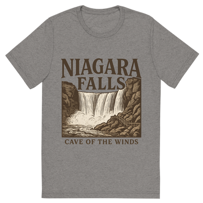 Front view of a Premium Tri-Blend Crew Neck T-Shirt in Grey showing 'A typographic, nostalgic graphic of a typographic illustration of the words 'niagara falls' with a vintage line art drawing of the cave of the winds'