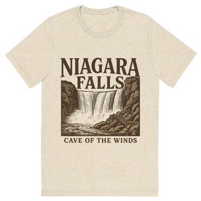 Front view of a Premium Tri-Blend Crew Neck T-Shirt in Oatmeal showing 'A typographic, nostalgic graphic of a typographic illustration of the words 'niagara falls' with a vintage line art drawing of the cave of the winds'