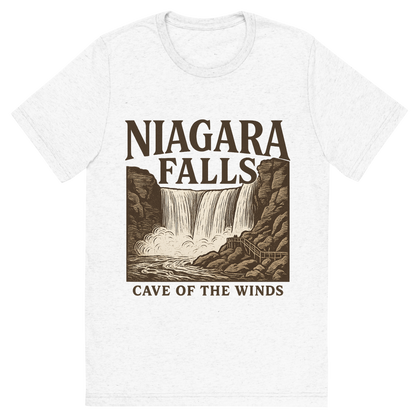Front view of a Premium Tri-Blend Crew Neck T-Shirt in Solid White showing 'A typographic, nostalgic graphic of a typographic illustration of the words 'niagara falls' with a vintage line art drawing of the cave of the winds'