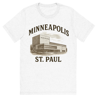 Front view of a Premium Tri-Blend Crew Neck T-Shirt in Solid White showing 'A typographic, nostalgic graphic of a typographic illustration of the words 'minneapolis-st. paul' with a vintage line art drawing of the walker art center'