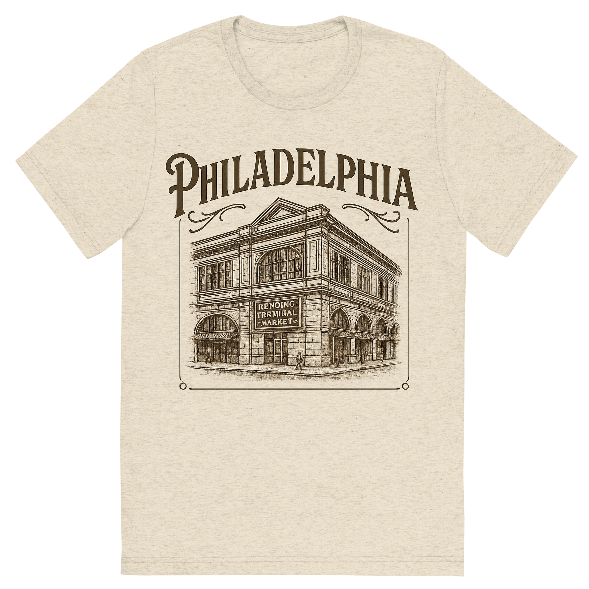 Front view of a Premium Tri-Blend Crew Neck T-Shirt in Oatmeal showing 'A typographic, nostalgic graphic of a typographic illustration of the words 'philadelphia' with a vintage line art drawing of the reading terminal market'