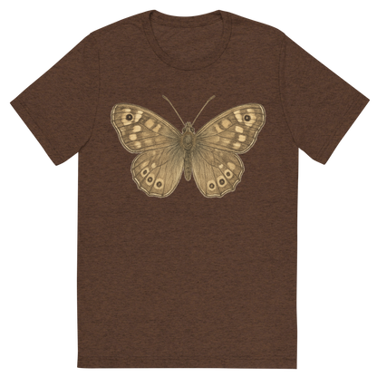 Front view of a Premium Tri-Blend Crew Neck T-Shirt in Brown showing 'A hand-drawn, tranquil graphic of speckled wood butterfly'