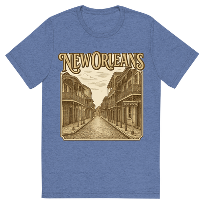 Front view of a Premium Tri-Blend Crew Neck T-Shirt in Blue showing 'A typographic, nostalgic graphic of a typographic illustration of the words 'new orleans' with a vintage line art drawing of bourbon street'