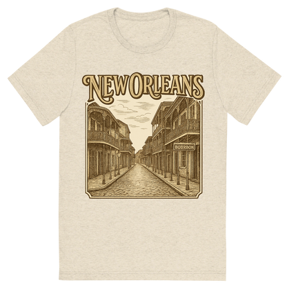 Front view of a Premium Tri-Blend Crew Neck T-Shirt in Oatmeal showing 'A typographic, nostalgic graphic of a typographic illustration of the words 'new orleans' with a vintage line art drawing of bourbon street'